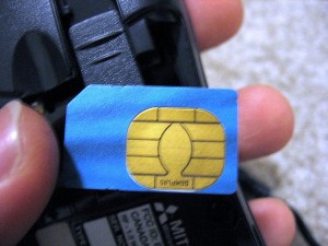 Closeup of SIM card and phone