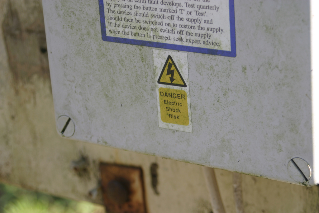 Sign that says, Danger electric shock risk