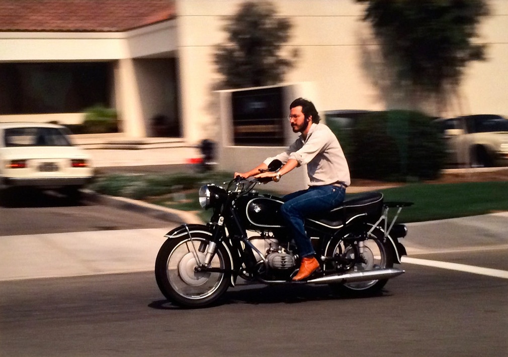 Portrait of Steve Jobs riding a motorcycle on Apple's campus, by Charles O'Rear, American Cool exhibit, Smithsonian Portrait Gallery