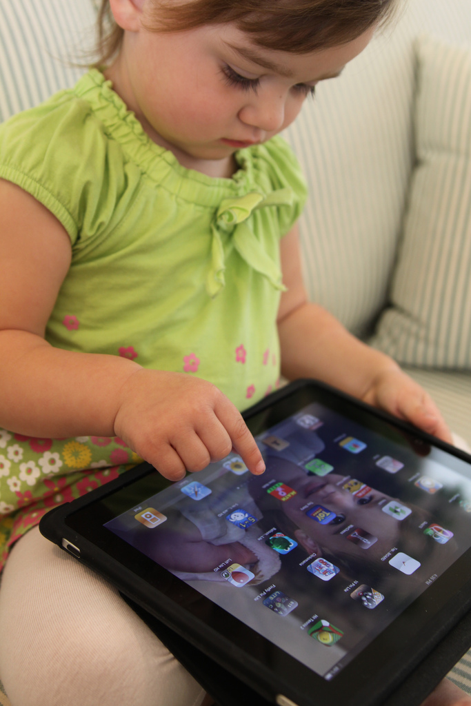 little girl with iPad