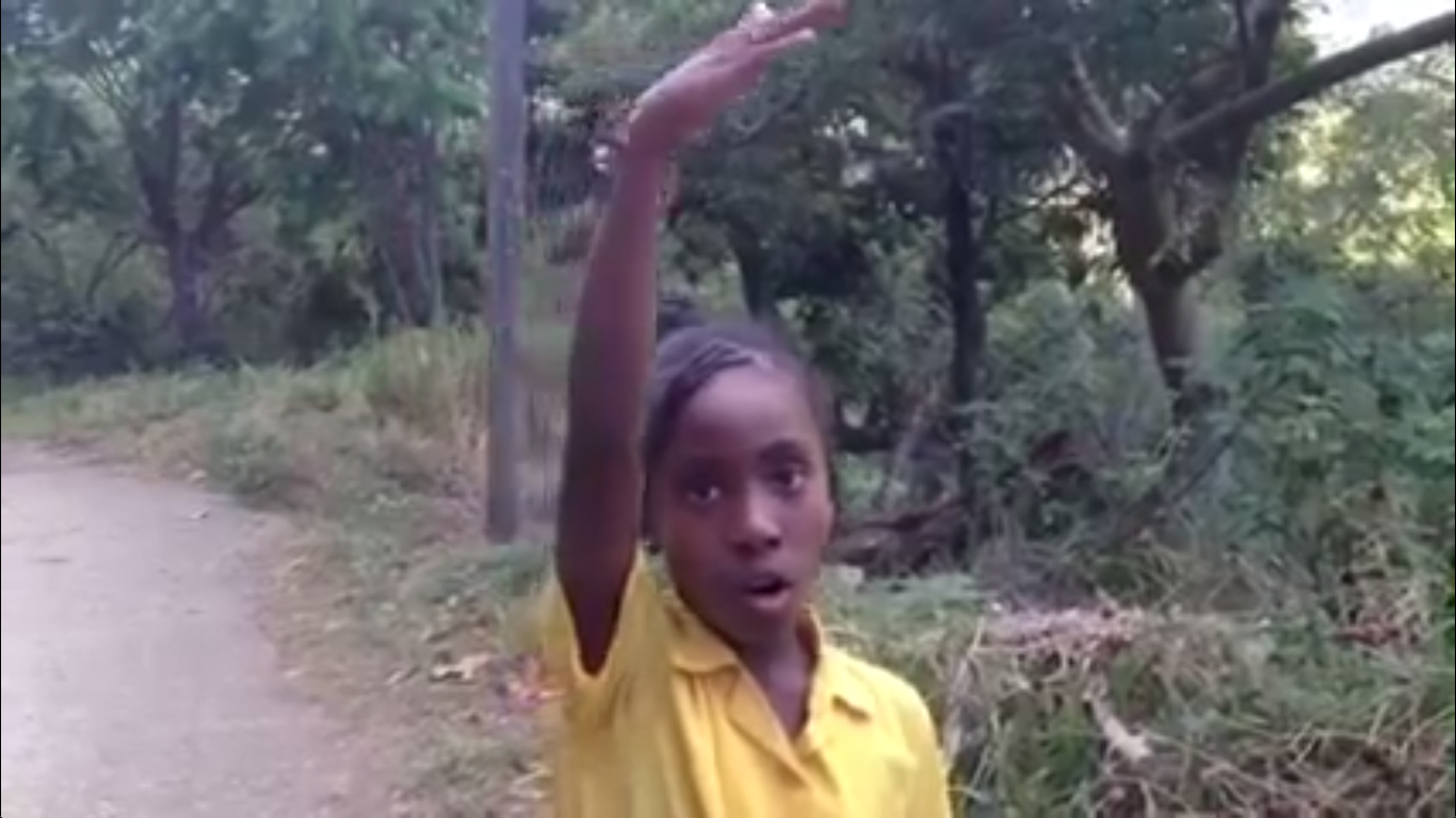 Jamaican girl gives directions in this video screencap